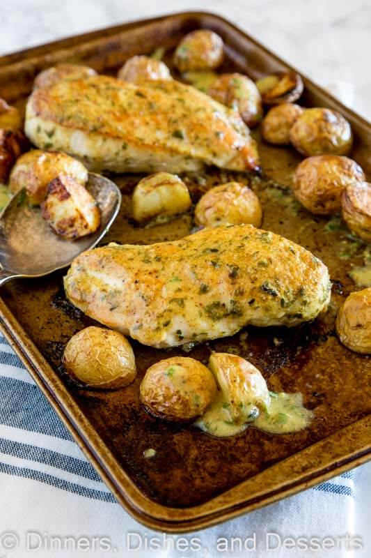 sheet pan chicken with potatoes on a pan