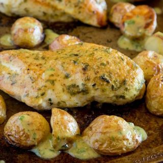 sheet pan chicken with potatoes on a pan