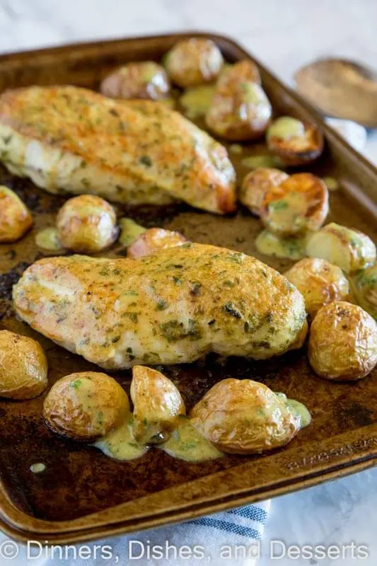 Sheet Pan Chicken with Roasted Potatoes - an easy chicken dinner all made on one sheet pan. Roast chicken and potatoes topped with an herb and mustard sauce.