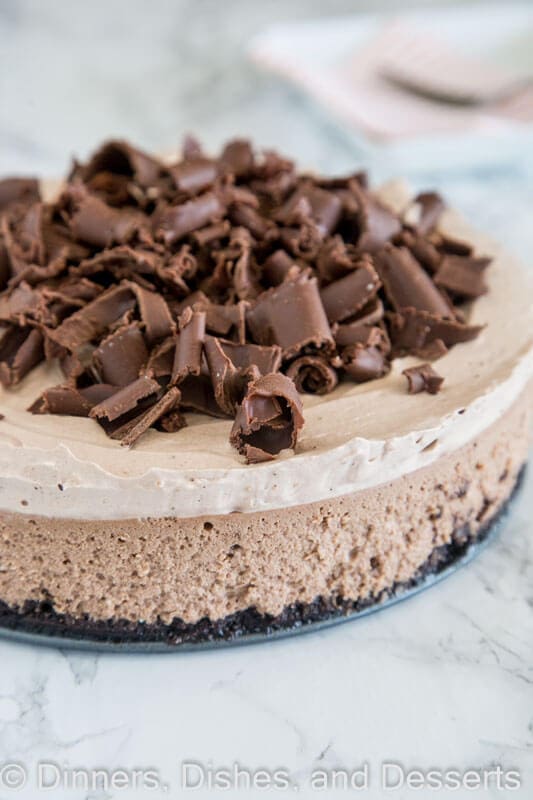 Baileys Chocolate Cheesecake - a rich and creamy chocolate cheesecake with the great taste of Baileys Irish Cream. Topped with Baileys whipped cream and plenty of chocolate shavings!