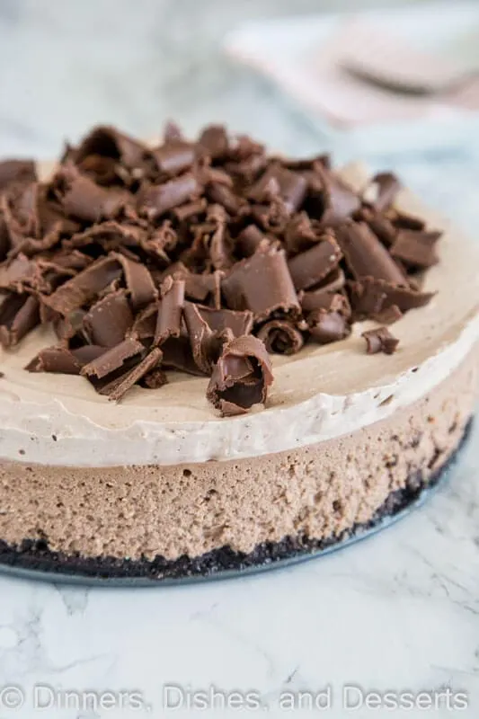 Baileys Chocolate Cheesecake - a rich and creamy chocolate cheesecake with the great taste of Baileys Irish Cream. Topped with Baileys whipped cream and plenty of chocolate shavings!