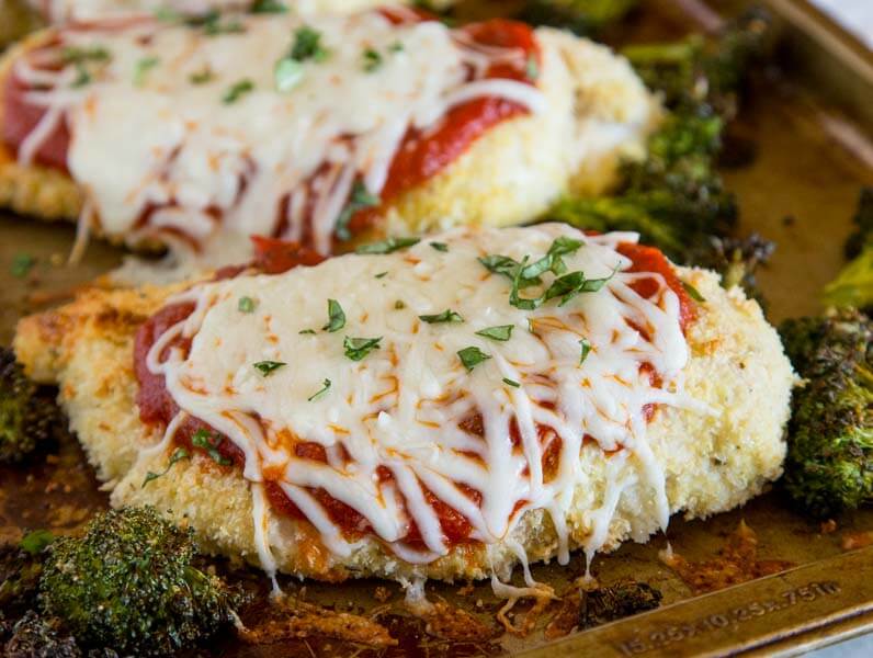 Baked Chicken Parmesan with Roasted Broccoli - a healthier version of chicken parmesan all made one one skillet! Super easy, quick and definitely family friendly.