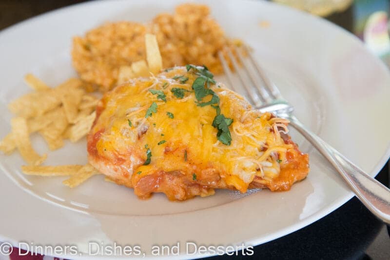 Southwest baked chicken on a plate with rice and a fork