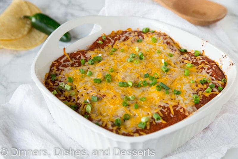 Stacked Chicken Enchiladas - all the flavors of chicken enchiladas in an easy layered casserole. Much less work, same great taste, so dinner is on the table fast!