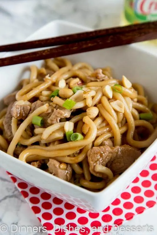 Asian Noodle Bowls with Pork - sweet, spicy, tangy, and oh so delicious! An easy dinner recipe full of so many great flavors. On the table in 30 minutes, and will disappear quickly.