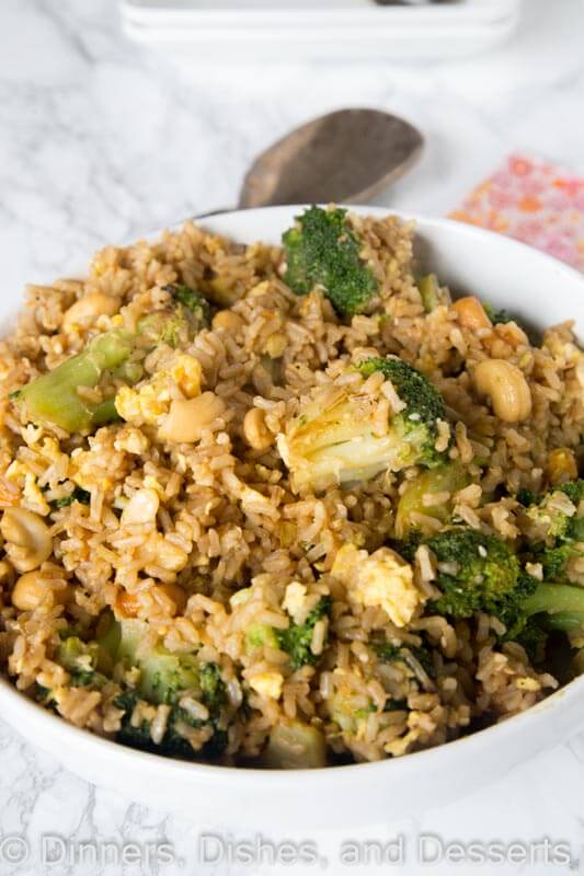 Nutty Fried Rice - a healthier fried rice recipe with cashews, broccoli, mushrooms and a creamy peanut butter dressing. So good, you won't even know you are eating something good for you!