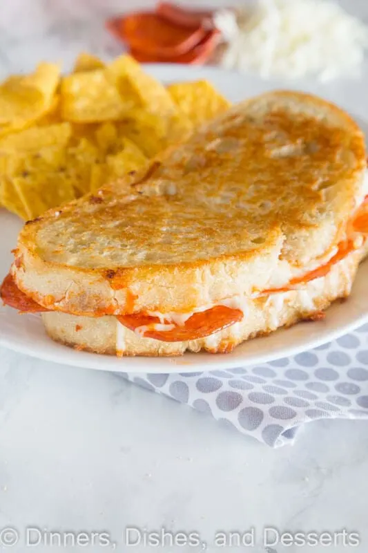 Pepperoni pizza grilled cheese on a plate