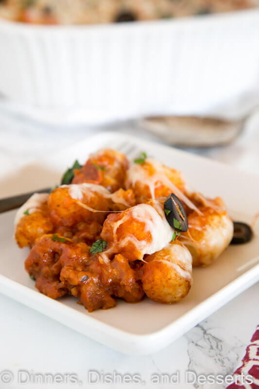 A close up of a pizza tater tot casserole