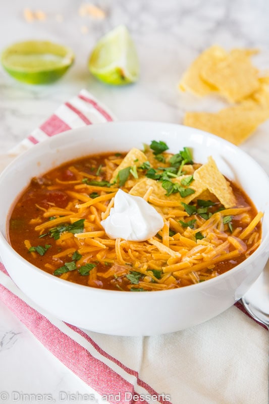 Easy Taco Soup - a hearty and comforting taco flavored soup that is ready in minutes. Top with your favorite toppings to make it even better!