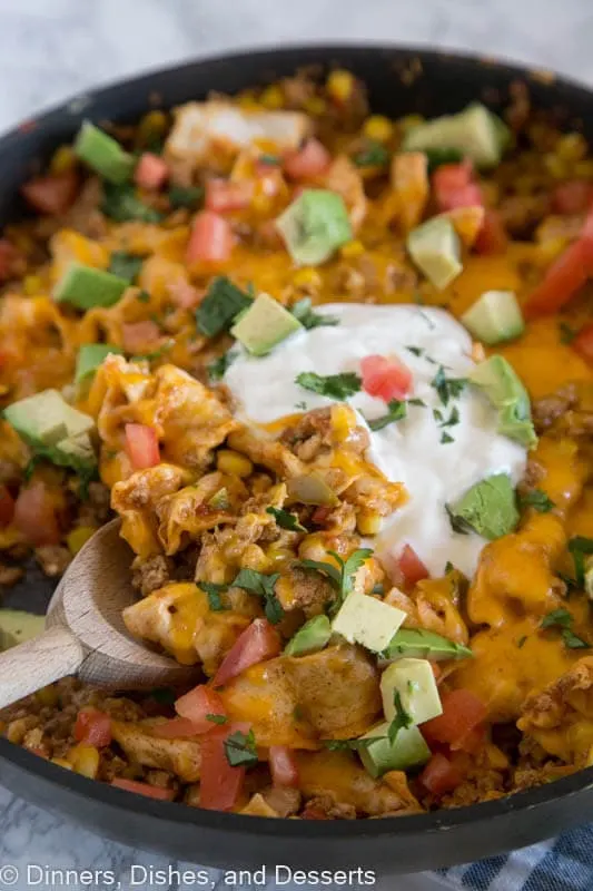 Beef Burrito Skillet - Mix up your taco night with this one pan meal that tastes like a beef burrito in a pan! Top with your favorite taco toppings!