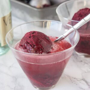 Black Cherry Sorbet - a slightly sweet, tangy and refreshing cherry sorbet. Served with prosecco or sweet sparkling wine for a fun grown up treat.