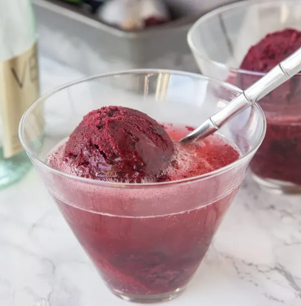 Black Cherry Sorbet - a slightly sweet, tangy and refreshing cherry sorbet. Served with prosecco or sweet sparkling wine for a fun grown up treat.