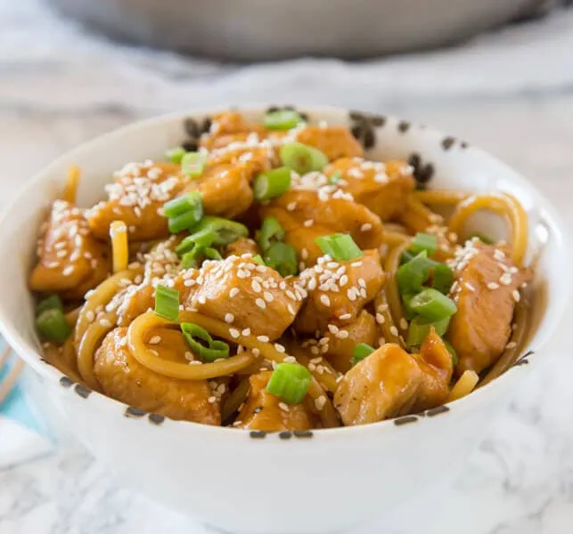 A plate of food, with Bowl and Chicken