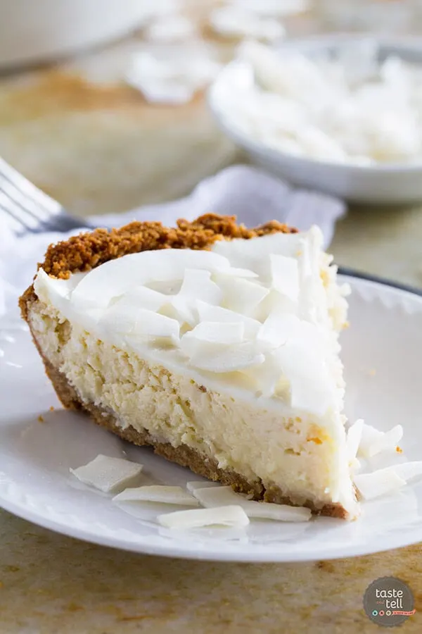 coconut cheesecake slice on a plate