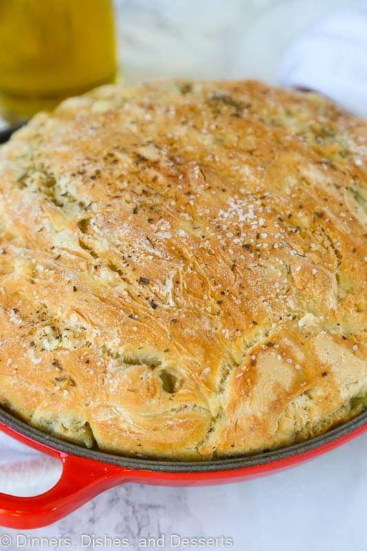 A close up of food, with Olive and Bread