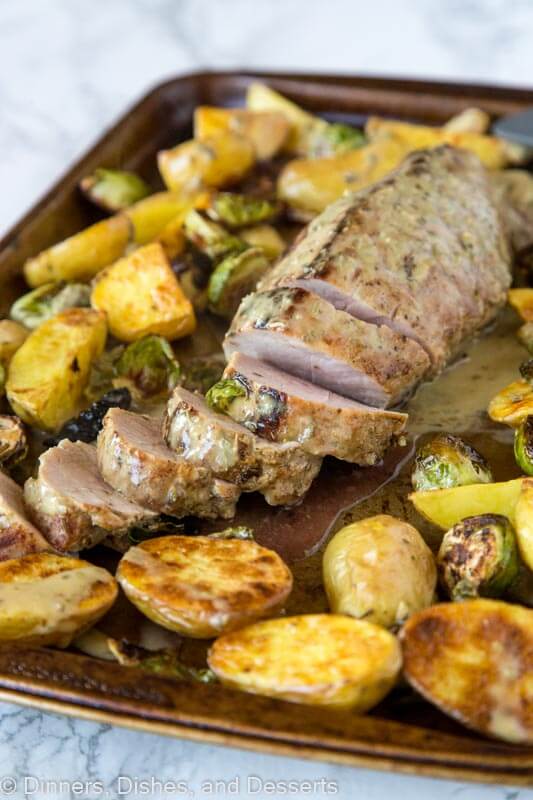 A tray of pork tenderloin and potatoes with Dinner and Pork