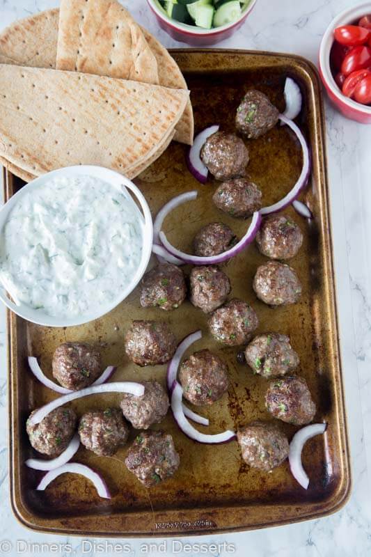 sheet pan with meatballs and tzatzki sauce