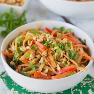 Thai Peanut Noodles - Super easy Asian noodles mixed with a creamy peanut butter sauce with bell peppers and carrots.