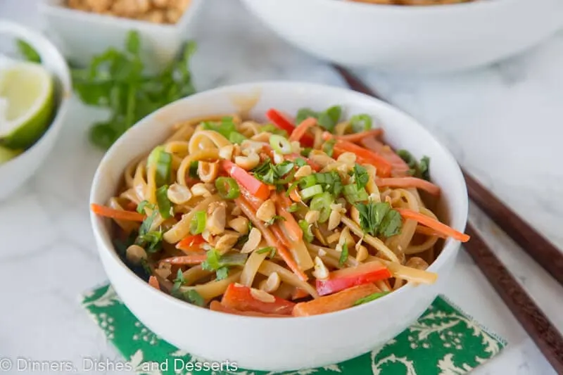 A bowl of noodles and vegetables on a table