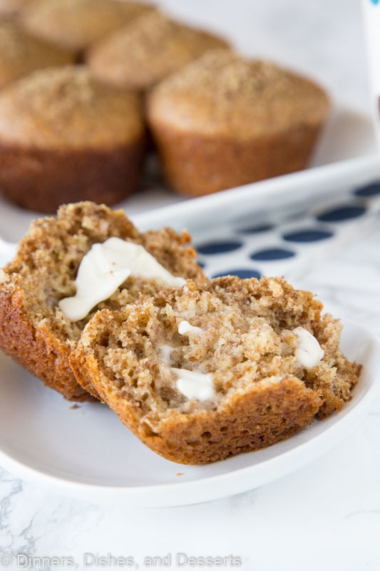 bran muffin on a plate with melting butter