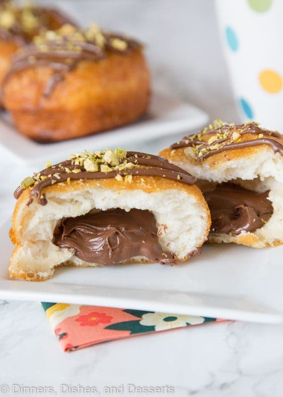 donut cut in half with nutella in the middle