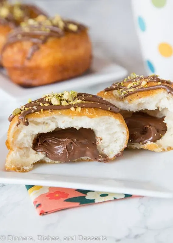 donut cut in half with nutella in the middle