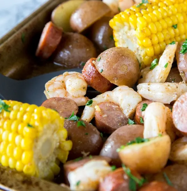 Sheet Pan Shrimp Boil - an easy homemade version of a classic shrimp boil, made in the oven. Shrimp, sausage, potatoes, and corn make for one amazing meal!