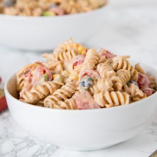 Taco Pasta Salad - a creamy pasta salad with all your favorite taco toppings! Great to make ahead and have in the fridge for dinner or to take to any get together.