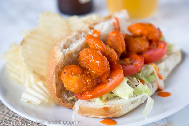 A plate of food, with Po\' boy and Ranch dressing