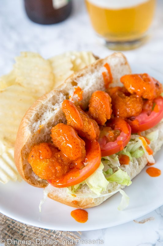 A plate of food on a table, with Shrimp and Sauce