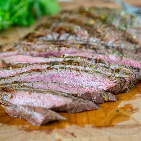 Grilled Chile Lime Flank Steak - flank steak that is marinated in olive oil, lime juice, cilantro, and jalapeno. Then grilled in just minutes for a super fast meal the whole family will love.