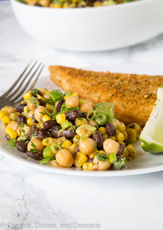 A plate of food on a table, with Chickpea and Salad