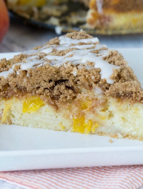 Peaches and Cream Coffee Cake - Fresh peaches give a bright and delicious twist to classic coffee cake. Enjoy with breakfast, coffee, dessert, or just because!