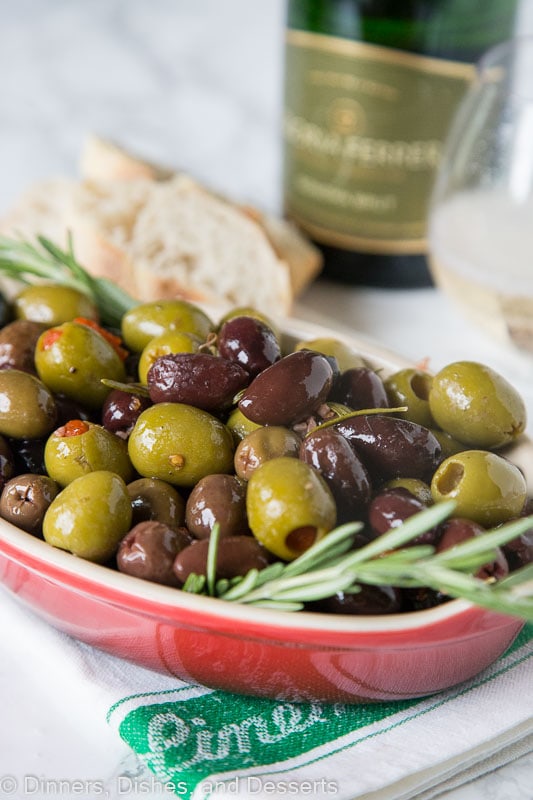 olives in a bowl with rosemary