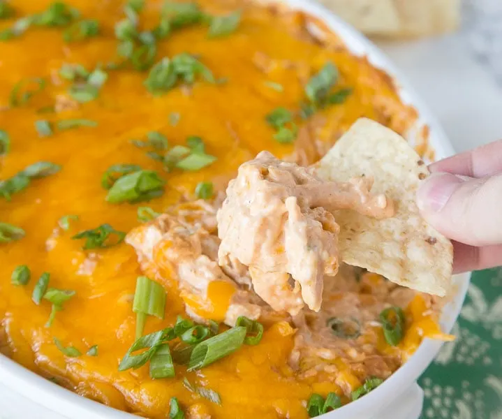 Barbecue Chicken Dip - get ready for game day and cover all your tailgating needs with this easy, cheesy dip!