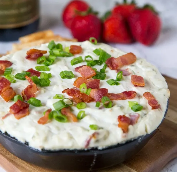 Baked Blue Cheese Dip - a creamy cheese dip recipe with bacon and lots of blue cheese. Warm, gooey, and great for parties! 