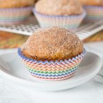 pumpkin muffin with cinnamon on top on a plate