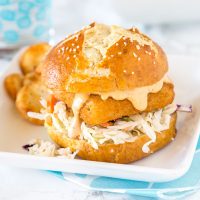 Spicy Fish Sandwich - Crispy fish sandwich with creamy coleslaw and a spicy tarter sauce. Easy dinner recipe for night of the week. 
