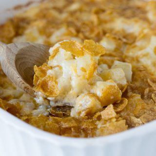 Baked Potato Casserole – a cheesy potato casserole that is great for entertaining, potlucks, or even busy weeknights. Comforting, delicious, and a family favorite.