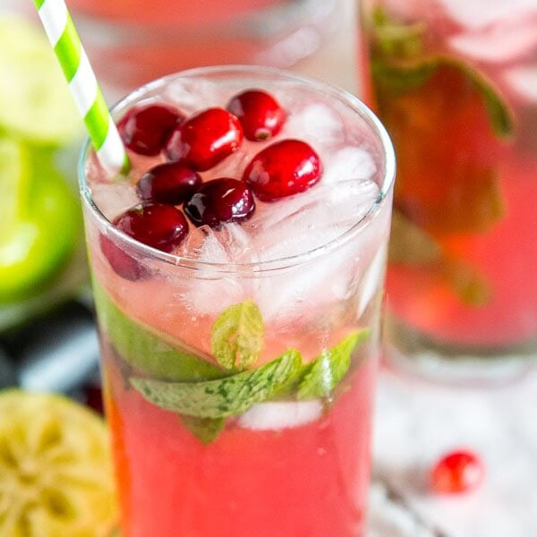 Cranberry Mojitos are a fun twist on a classic mojito to make the fun and festive for the holidays! Â
