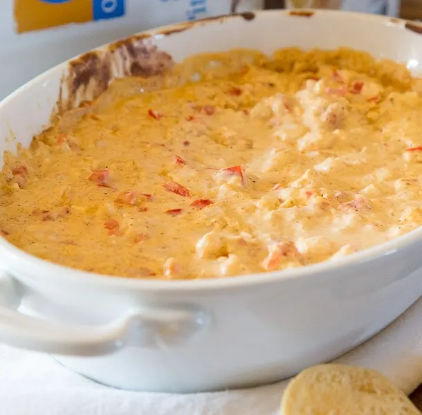 Spicy Shrimp Dip - a quick and easy dip that is great to serve at any get together. You can make ahead and heat right before guests arrive! 