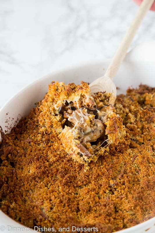 mushroom casserole in a dish with a spoon