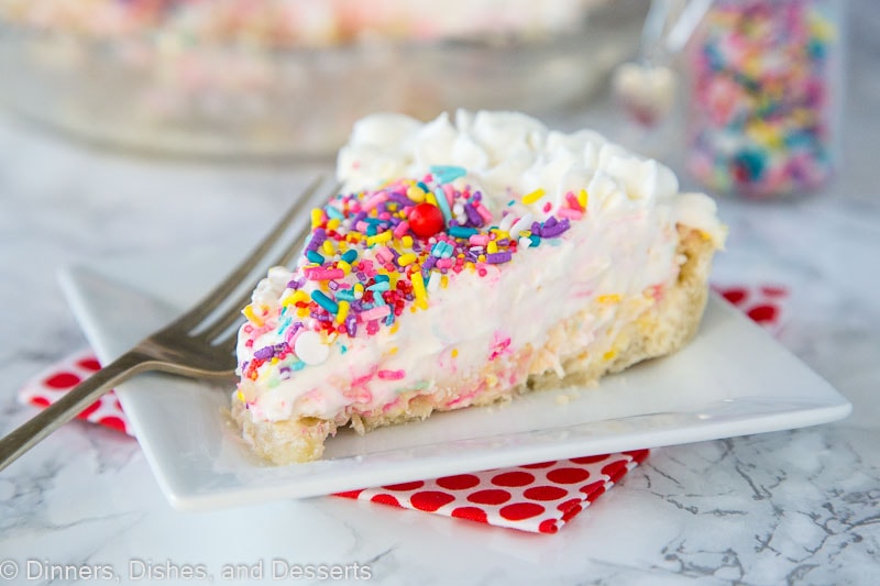  Cheesecake pie on a plate with sprinkles