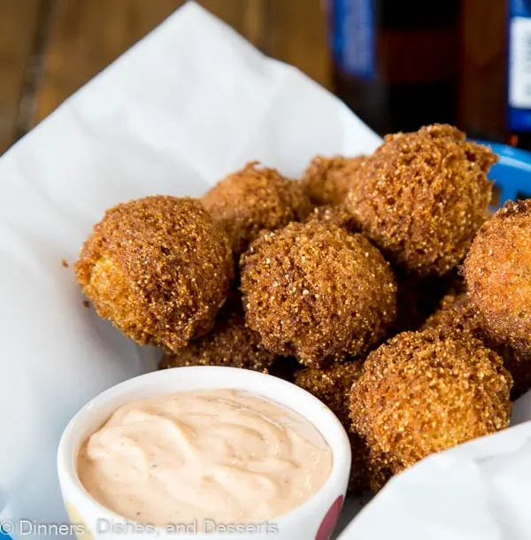Homemade Hush Puppies Recipe - the lightest and fluffiest hushpuppies ever. So easy to make, delicious, crispy and great for game day, snacks, or even a side dish with dinner.