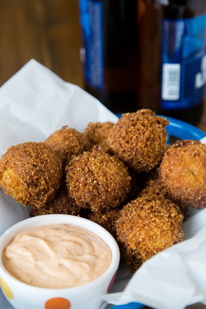 Homemade Hush Puppies Recipe - the lightest and fluffiest hushpuppies ever. So easy to make, delicious, crispy and great for game day, snacks, or even a side dish with dinner. 