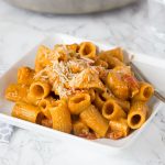 Bruschetta Chicken Pasta - an easy chicken pasta loaded with lots of tomatoes, seasoned chicken, and topped with Parmesan cheese. Easy to make and ready quickly for any night of the week.