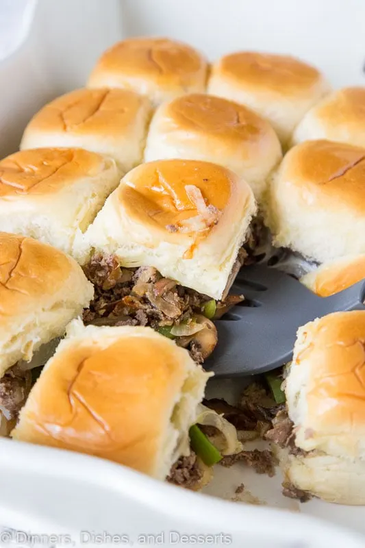 Philly Cheesesteak Sliders - little cheesesteak sliders are stuffed with sauteed onions, peppers, mushrooms, and lots of melty cheese! Great for a party, game day, or a fun and easy dinner! 