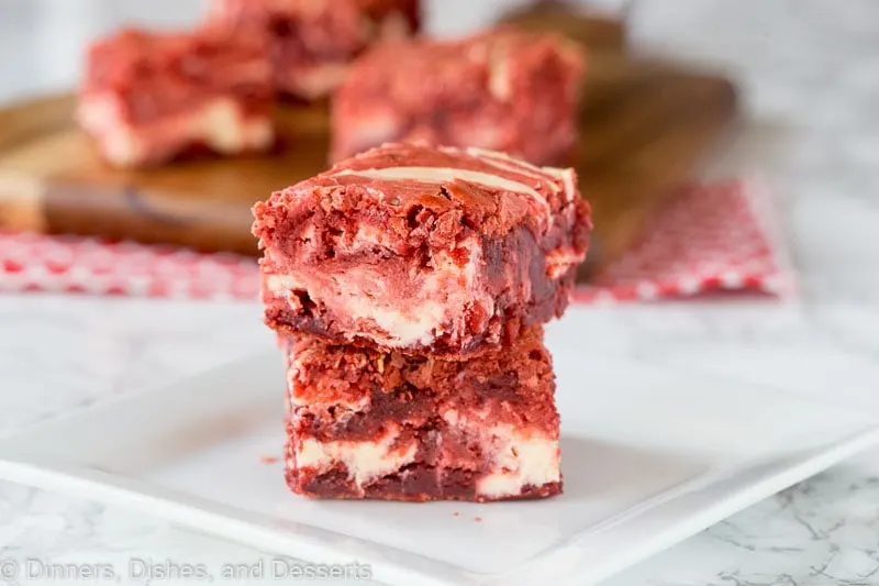 red velvet brownies with cream cheese swirl on a plate