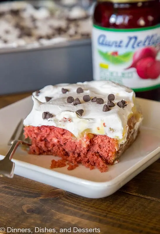 A close up of a piece of cake sitting on top of a table