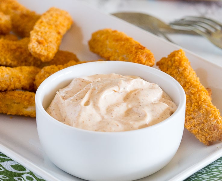 Spicy Cajun Dipping Sauce - this makes a great dip crunch fish sticks, topping for burgers, or even just a dip with chips. Perfectly creamy with a little kick!